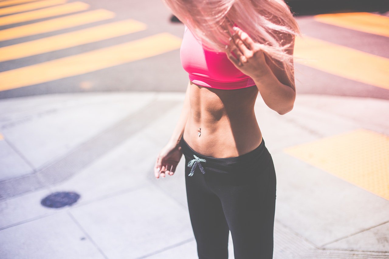 woman looking at stomach