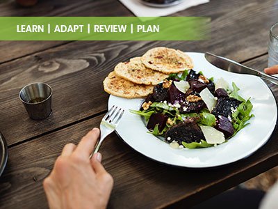 man eating salad