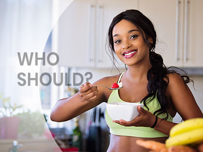 woman eating salad