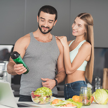 Happy Couple With Shaker