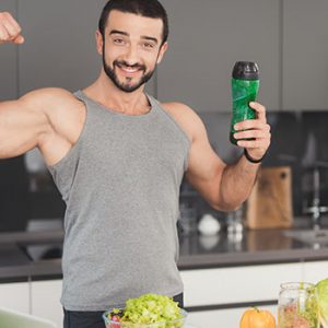 man holding a tumbler