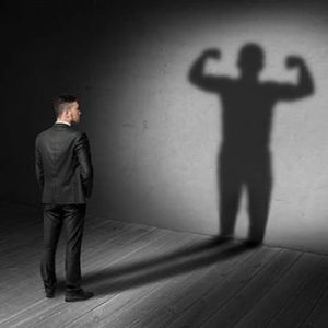 man watching his shadow