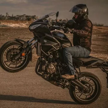 man riding motorcycle