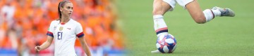 woman soccer player in a field